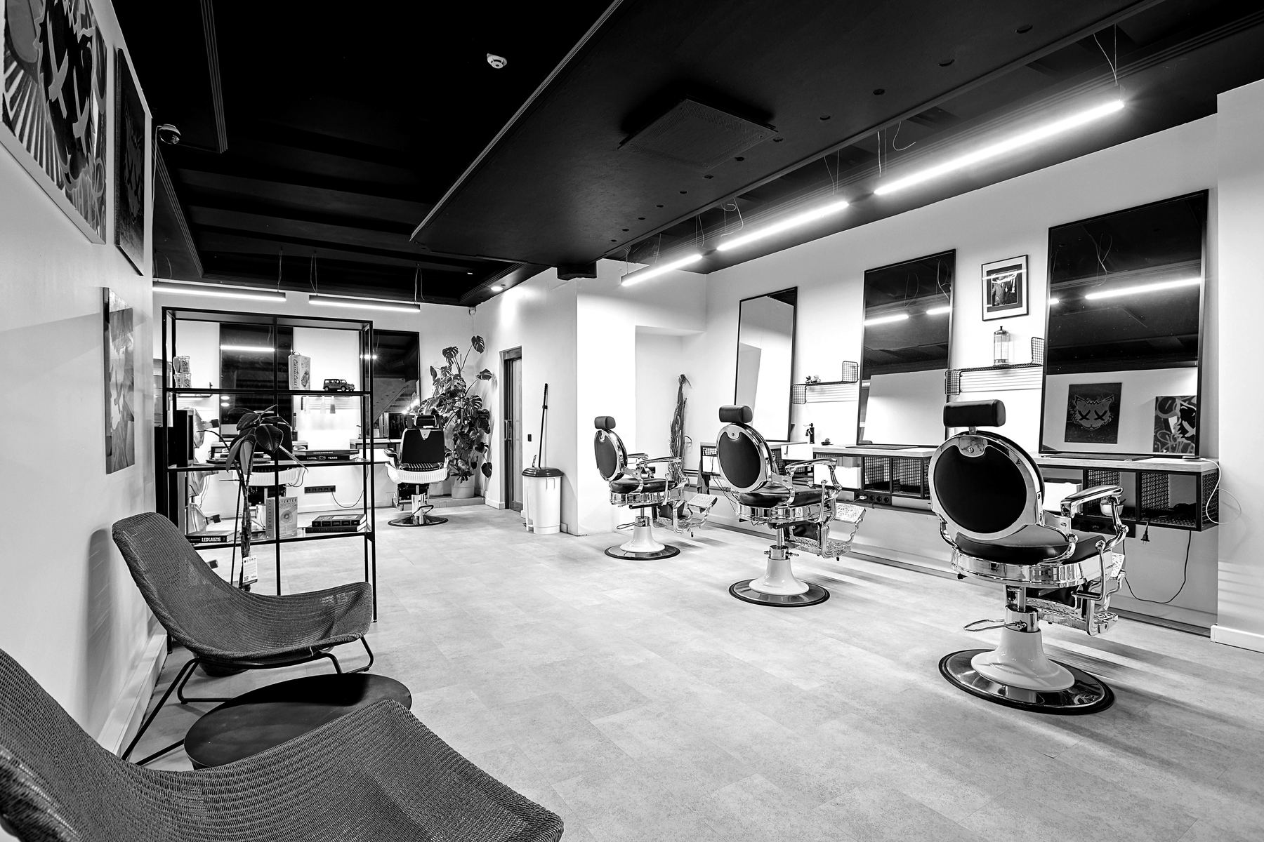 BARBERS HUB interior with professional workstations
